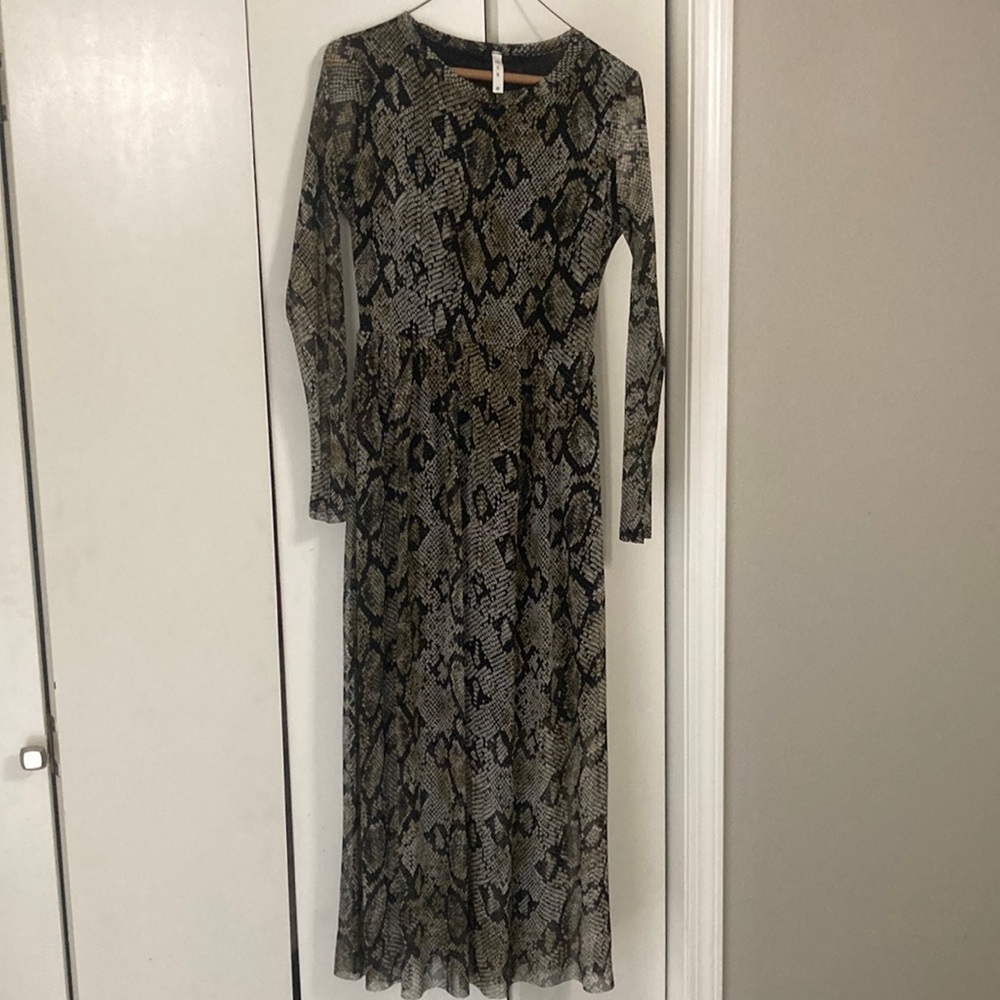 Python print mess dress. Only sleeves are see-through. Very comfortable fit.